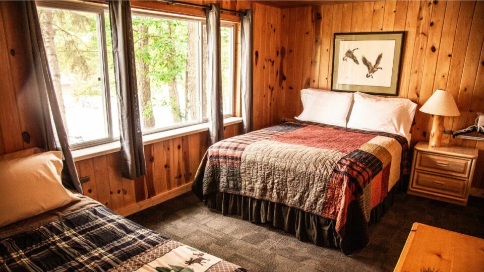 Cabin Rental 10 Interior Bedroom with Queen Sized and Twin Sized Beds