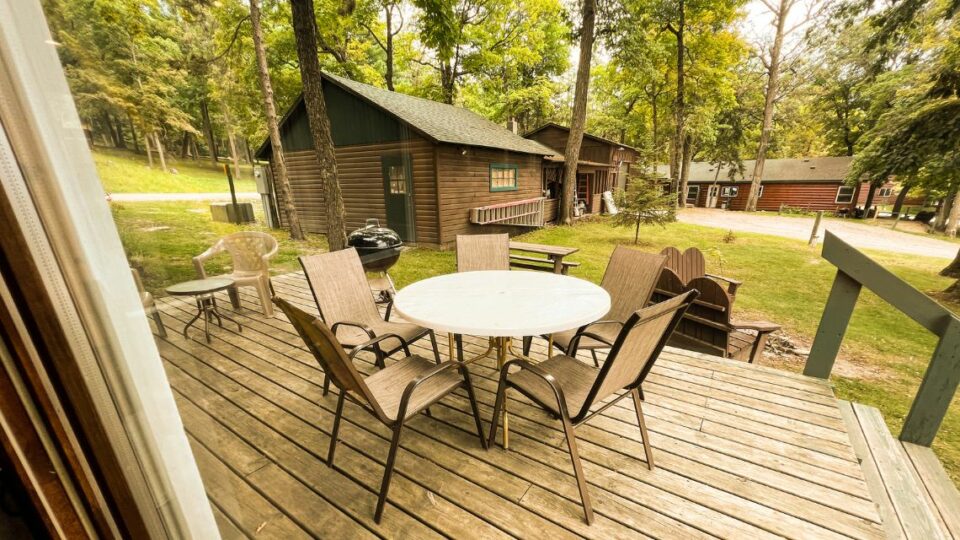 Cabin Rental 10 Exterior Porch with Table and Chairs