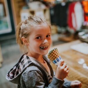 A Kid enjoying Ice Cream